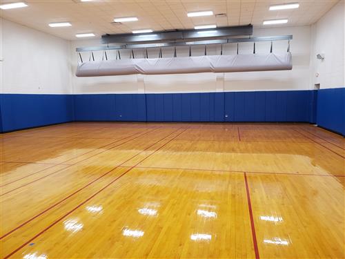 Refinished floors in the RHS wrestling room 